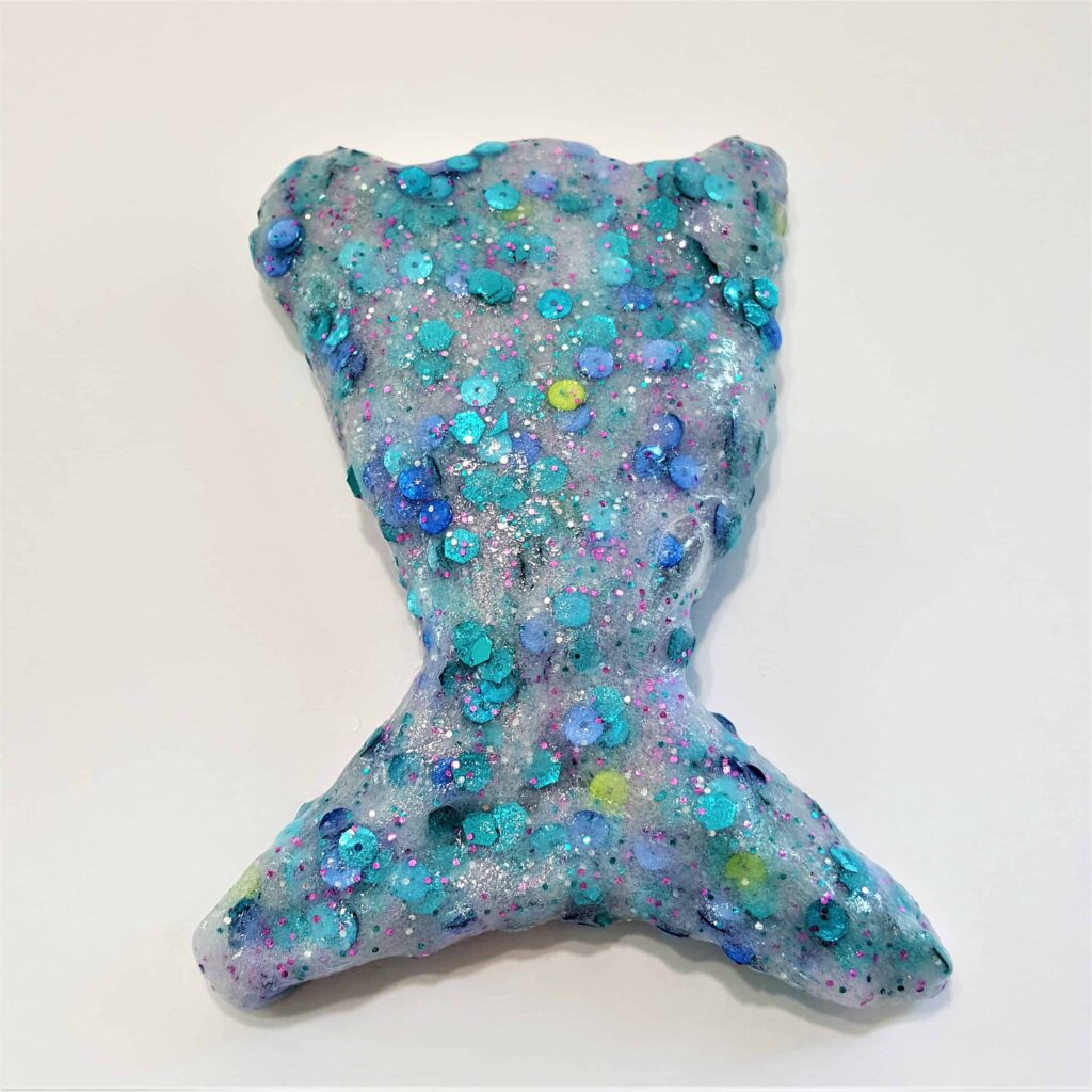 Mermaid Slime - Slimmer & Shine Slime | Mermaid Slime is the ultimate glitter slime! It has a wonderfully unique and fun texture. Using a clear slime base makes this an easy and fun kids craft!