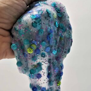 Mermaid Slime - Slimmer & Shine Slime | Mermaid Slime is the ultimate glitter slime! It has a wonderfully unique and fun texture. Using a clear slime base makes this an easy and fun kids craft!