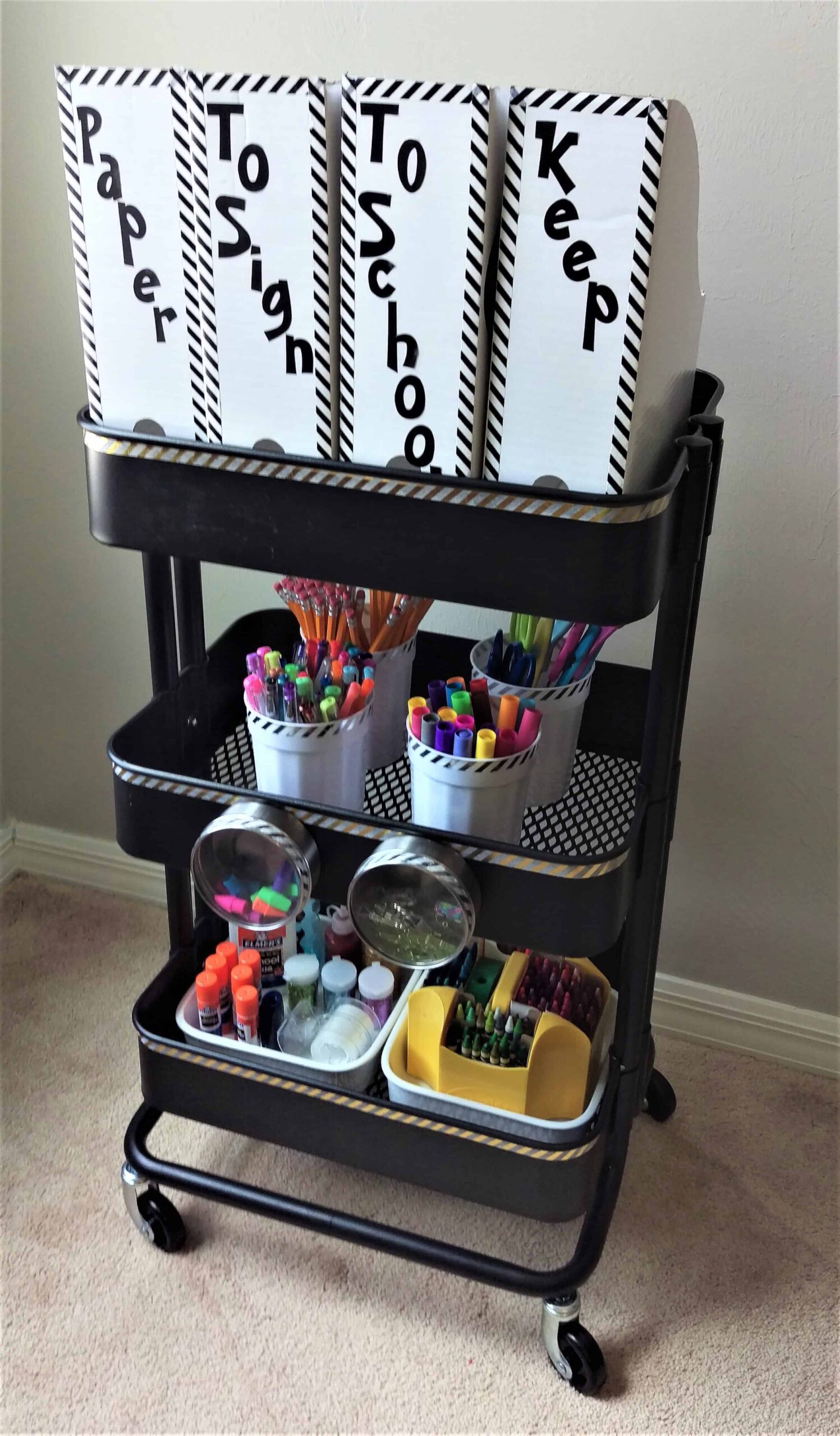 Homework Station | How to put together this sanity-saving homework station. Make going back to school easier and more organized with this homework station so you have all your supplies in one place!
