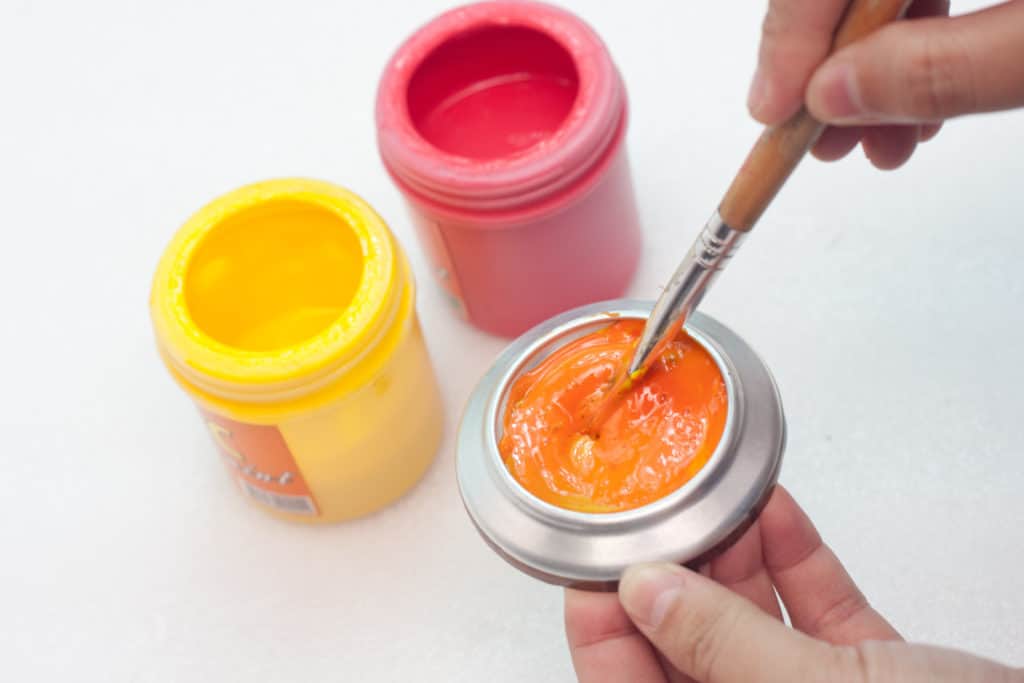 Mixing orange paint for pumpkin