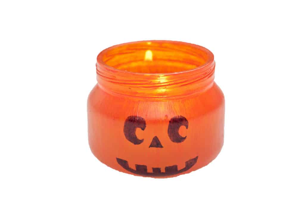 Glass jack-o-lantern jar