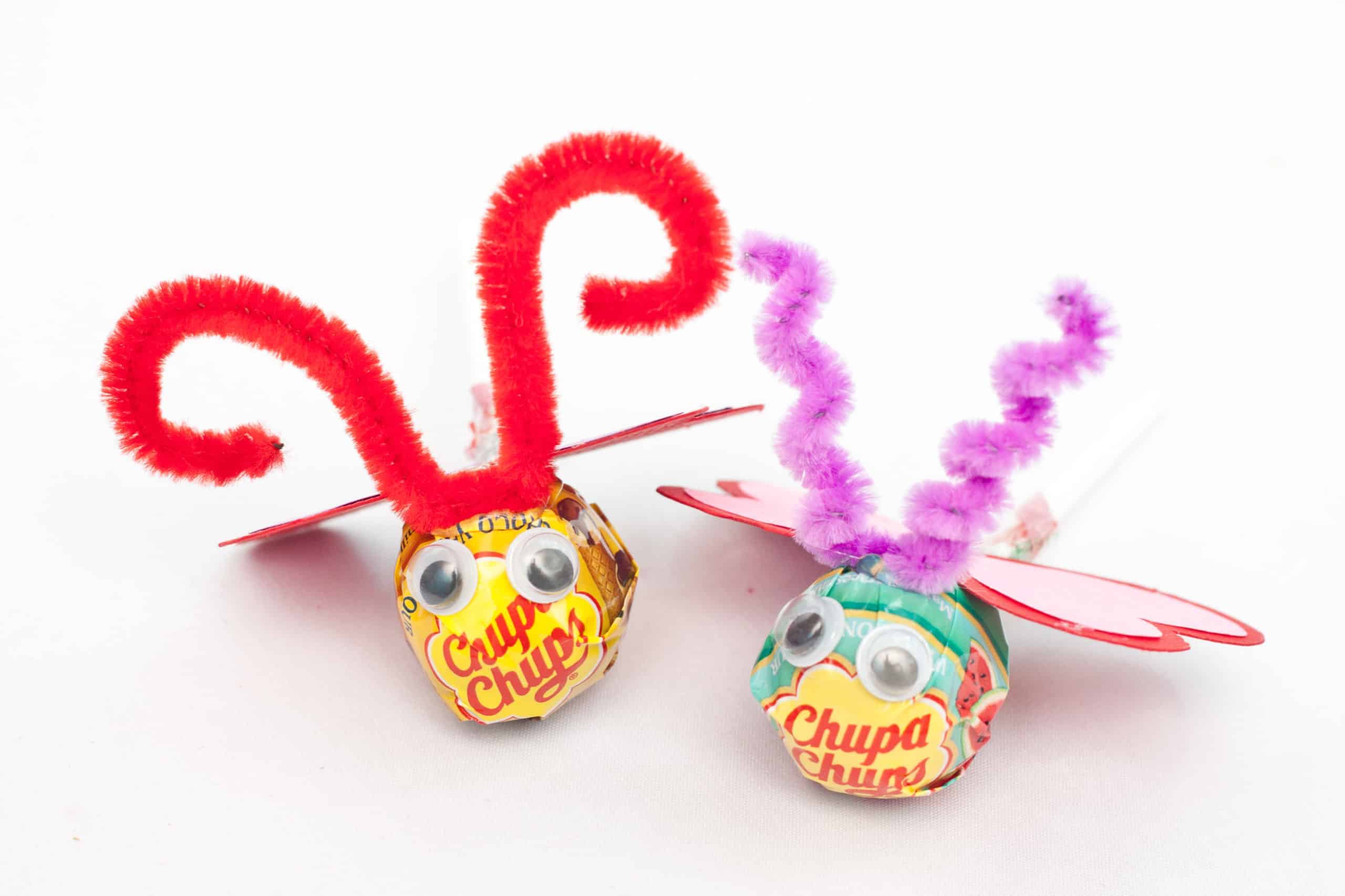 Valentine Lovebugs- construction paper hearts, googly eyes, craft sticks  and pipe cleaner.