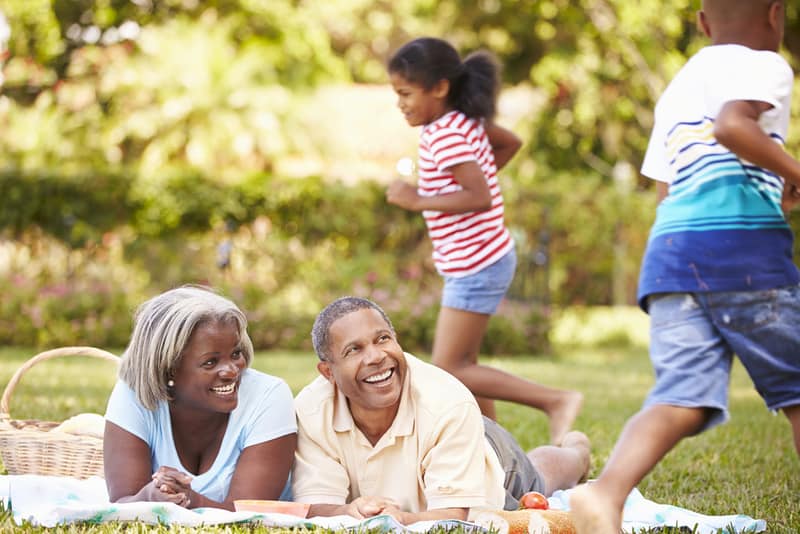 sustainable activity - family having a picnic together